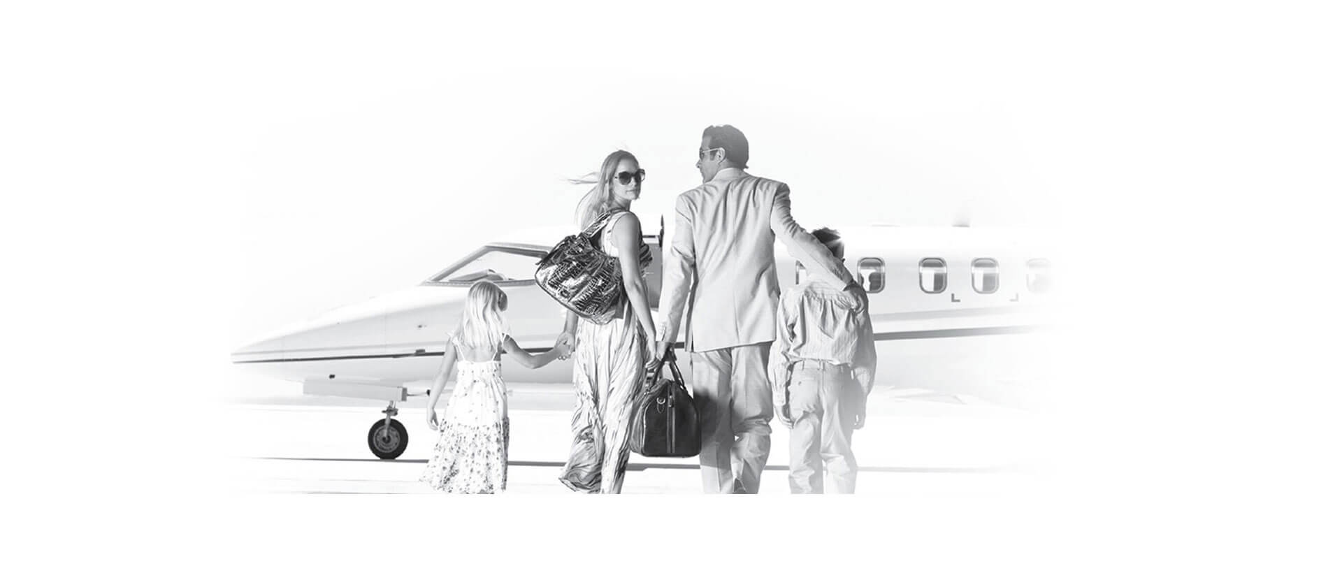 A family walking toward a private jet — the founder's aspiration for Vietnamese success